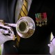 Navy veteran Steven Schaljo plays ‘Taps’ in honor of Memorial Day